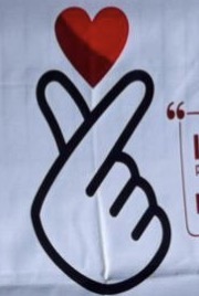 Gesto de corazón con los dedos, símbolo de la plataforma